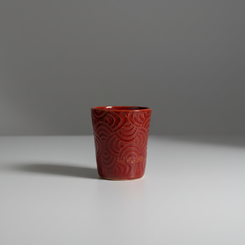 Red coffee cup studio image